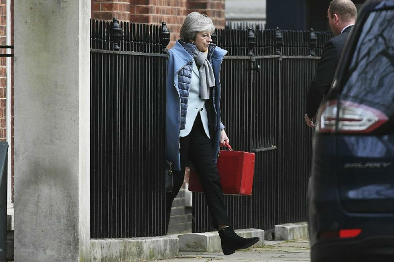 British Prime Minister Theresa May  leaves her 10 Downing St.  residence in London for talks Friday with Cabinet members and  European leaders on the U.K.’s exit from the European Union. 