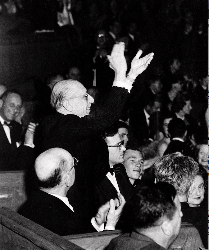 Composer Igor Stravinsky applauds at the close of a performance of his "Rite of Spring" by the Boston Symphony Orchestra in Paris in this May 1952 photo. (Democrat-Gazette file photo)
