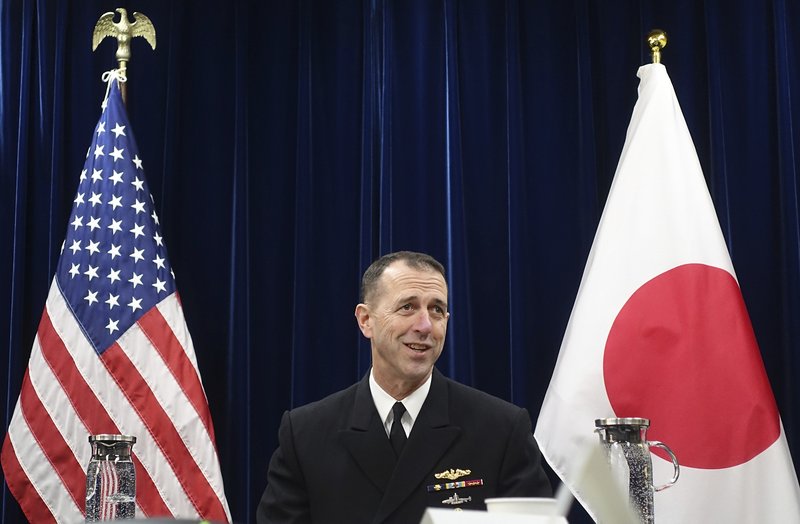 Chief of U.S. Naval Operations Adm. John Richardson talks to reporters on regional security issues in Tokyo Friday, Jan. 18, 2019. The U.S. Navy's top officer says he urged China to follow international rules at sea to avoid confrontations and insisted that ships should be able to pass safely though disputed areas of the South China Sea and Taiwan Strait. (AP Photo/Mari Yamaguchi)