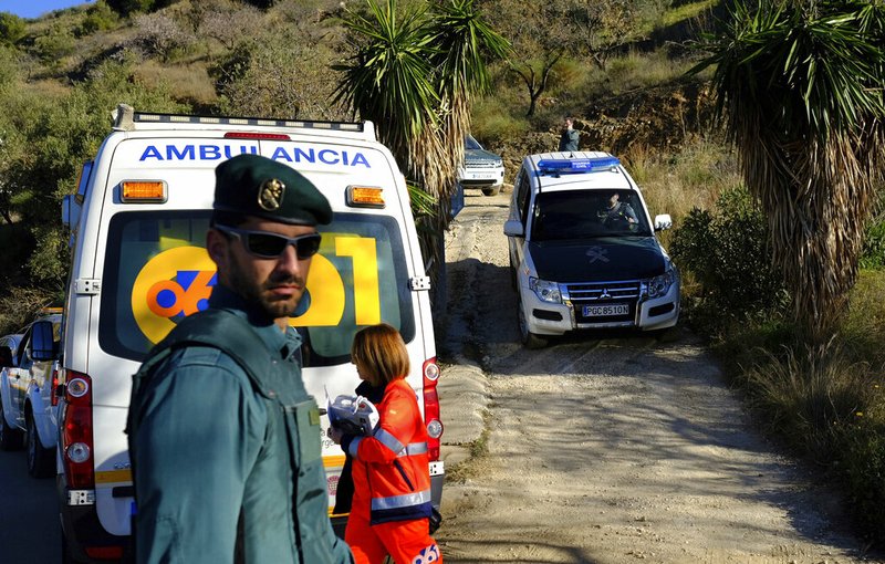 Emergency services look for a 2 year old boy who fell into a well, in a mountainous area near the town of Totalan in Malaga, Spain, Monday, Jan. 14, 2019. More than 100 firefighters and emergency workers in southern Spain are searching for a 2-year-old toddler who fell into a narrow and deep well on Sunday. Rescuers believe the boy fell into the 100-meter-deep well after walking away from his parents. (AP Photo/Gregorio Marrero)