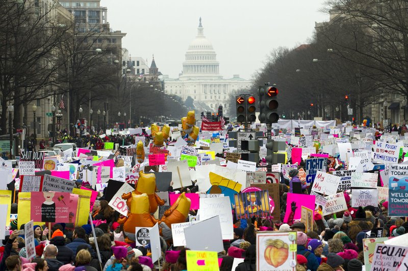 Demonstrators march on Pennsylvania Avenue during the Women's March in Washington on Saturday, Jan. 19, 2019.