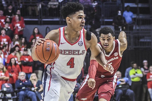 Mississippi guard Breein Tyree (4) dribbles against Arkansas guard Jalen Harris (5) during an NCAA college basketball game in Oxford, Miss., on Saturday, Jan. 19, 2019. (Bruce Newman/The Oxford Eagle via AP)

