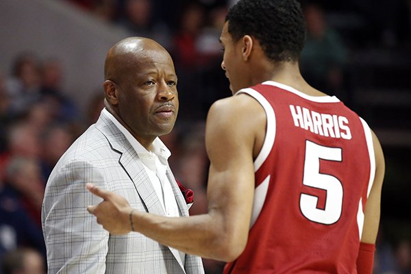 Arkansas head coach Mike Anderson confers with guard Jalen Harris (5) during the second half of the NCAA college basketball game against Mississippi, in Oxford, Miss., Saturday, Jan. 19, 2019. Mississippi won 84-67. (AP Photo/Rogelio V. Solis)


