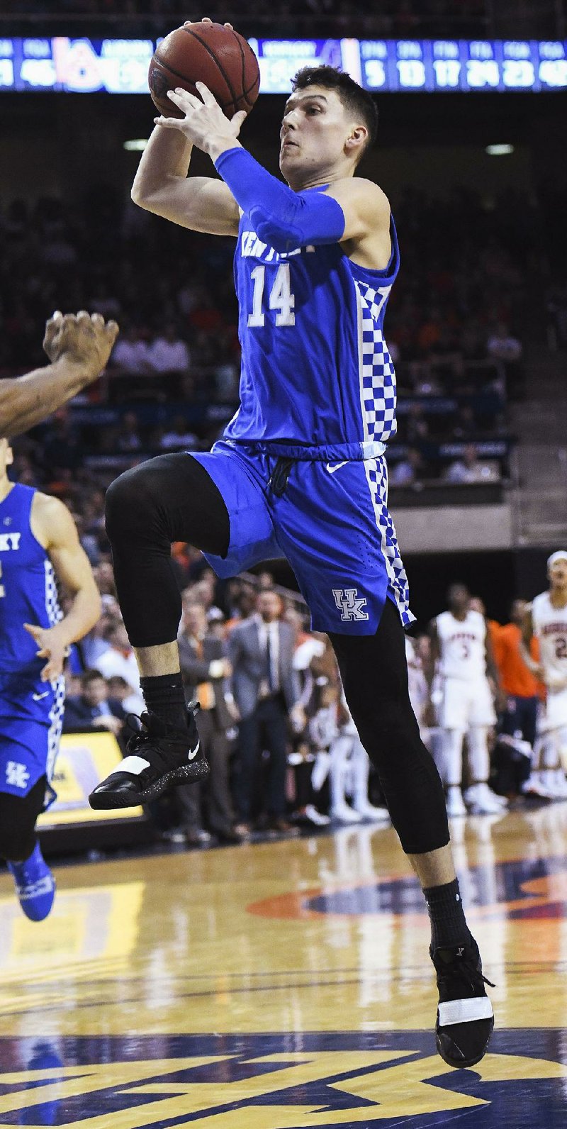 Kentucky guard Tyler Herro (14) scored 10 points in the final 5:23, and made two free throws with 24 seconds left to help lift the No. 12 Wildcats to an 82-80 victory over No. 14 Auburn on Saturday in Auburn, Ala.