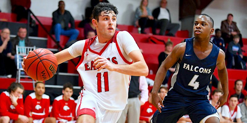 The Sentinel-Record/Grace Brown SETTING THE PACE: Cutter Morning Star junior Ryan Brown (11) rounds Maumelle Charter guard Jarmall Lovelace (4) Friday during the Eagles' 60-42 win inside Eagle Fieldhouse. Brown led all scorers with 26 points.