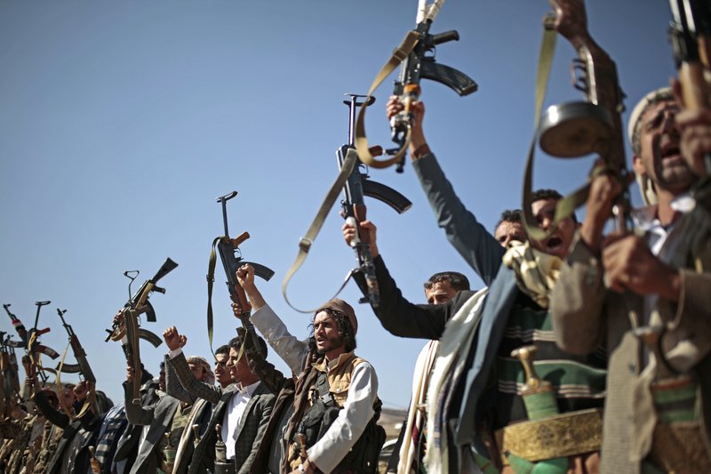 The Associated Press SHOWING SUPPORT: In this Dec. 13, 2018, file photo, tribesmen loyal to Houthi rebels hold up their weapons as they attend a gathering to show their support for the ongoing peace talks in Sanaa, Yemen. U.N. experts say fuel is being shipped illegally from Iran to Houthi Shiite rebels in Yemen to finance their war against the government, and both sides are violating international law with their military campaigns and arbitrary detention of rivals.