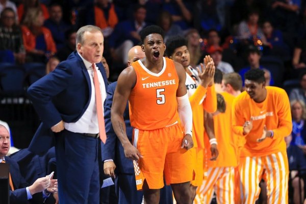 Tennessee guard Admiral Schofield (5) celebrates next to coach Rick Barnes during the second half of the team's NCAA college basketball game against Florida on Saturday, Jan. 12, 2019, in Gainesville, Fla. (AP Photo/Matt Stamey)