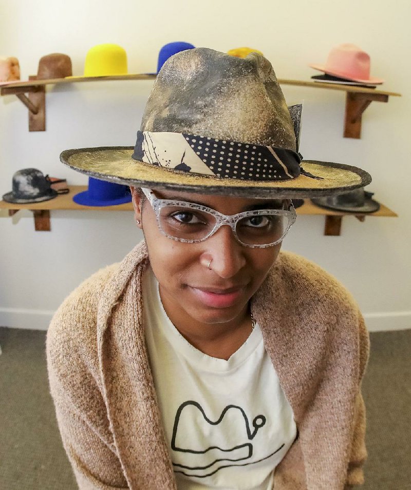 Markia Herron started wearing hats during college to add some pop to the neutral colors she prefers in her outfits. 