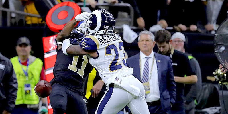 The Associated Press BLOWN CALL: Rams cornerback Nickell Robey-Coleman (23) was not penalized for interfering with Saints receiver Tommylee Lewis (11) late in Sunday's 26-23 overtime victory for Los Angeles in New Orleans.