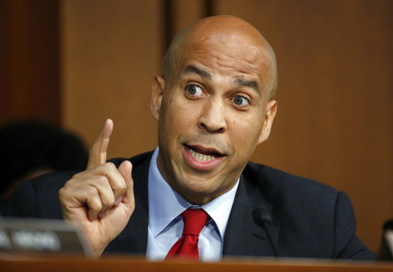 FILE - In this Thursday, Sept. 6, 2018, file photo, Sen. Cory Booker, D-N.J., speaks on Capitol Hill in Washington. As the 2020 presidential primary takes shape, almost no policy is too liberal for Democrats fighting to win over their party's base. Booker, who is expected to launch his presidential campaign in early 2019, has sponsored legislation to create a federal jobs guarantee program in several communities across America. (AP Photo/Alex Brandon, File)