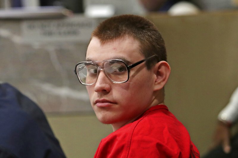 In this Jan. 16, 2019 file photo, Parkland school shooting suspect Nikolas Cruz sits during a status hearing at the Broward Courthouse in Fort Lauderdale, Fla. A Florida judge has denied an effort by defense attorneys to hold the Broward Sheriff's Office in contempt of court for releasing Cruz's medical records to a state investigative commission. The order dated Tuesday, Jan. 22, by Circuit Judge Elizabeth Scherer says the records release was limited, not done in bad faith and was an isolated incident. (John McCall/South Florida Sun-Sentinel via AP, Pool)