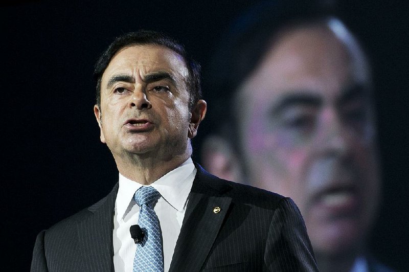  In this March 23, 2016, file photo, Carlos Ghosn, the former Chairman and CEO of both Nissan and Renault, speaks at the New York International Auto Show in New York. 