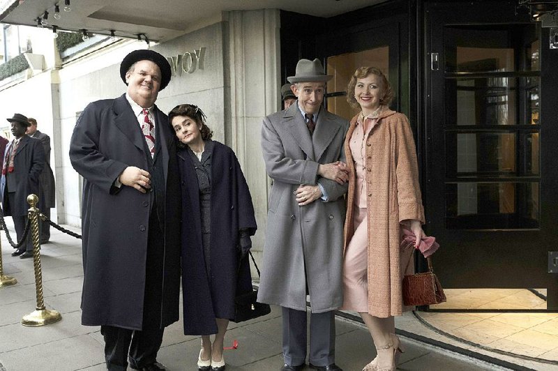 Oliver “Babe” Hardy (John C. Reilly) and Stan Laurel (Steve Coogan) are joined by their respective wives, Virginia Jones (Shirley Henderson) and Ida Raphael (Nina Ariande), during their final tour of the U.K. in Jon S. Baird’s wistful Stan & Ollie. 