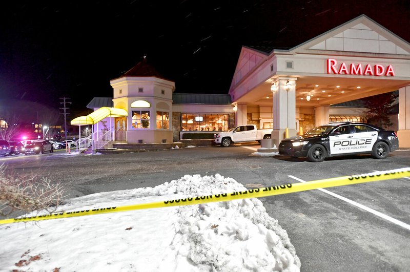 State College Police respond to a shooting at P.J. Harrigan's Bar &amp; Grill at the Ramada Inn Thursday, Jan. 24, 2019, in State College, Pa. (Abby Drey/Centre Daily Times via AP)