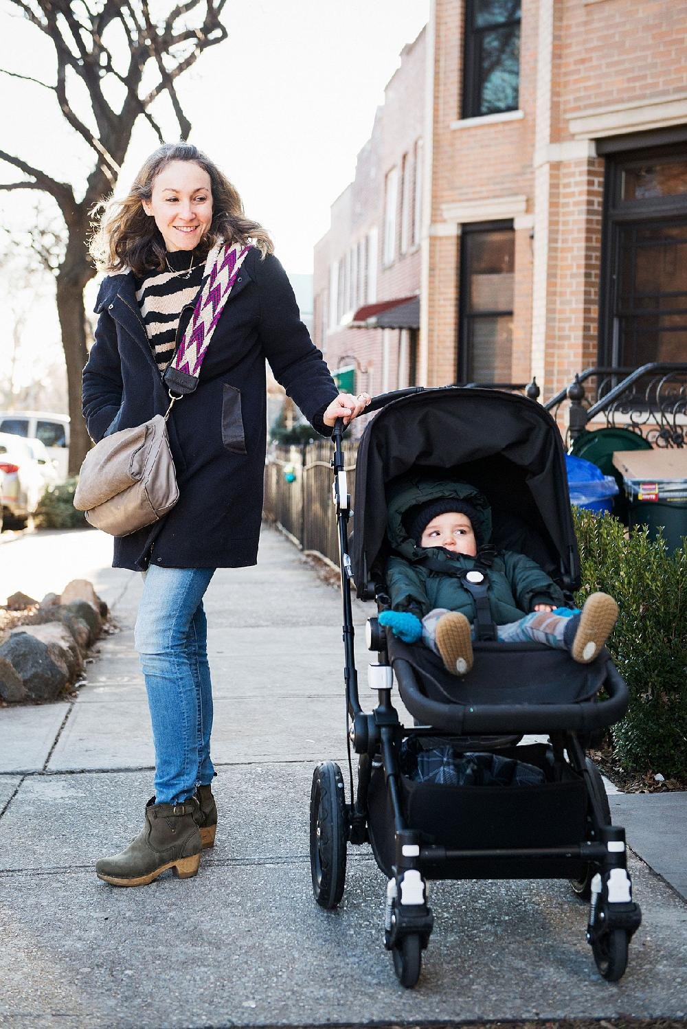 New York mothers have adopted a uniform of clogs and woven purse straps, The Independent