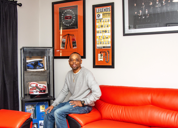 Shawn Brown is surrounded by memorabilia in his lounge.