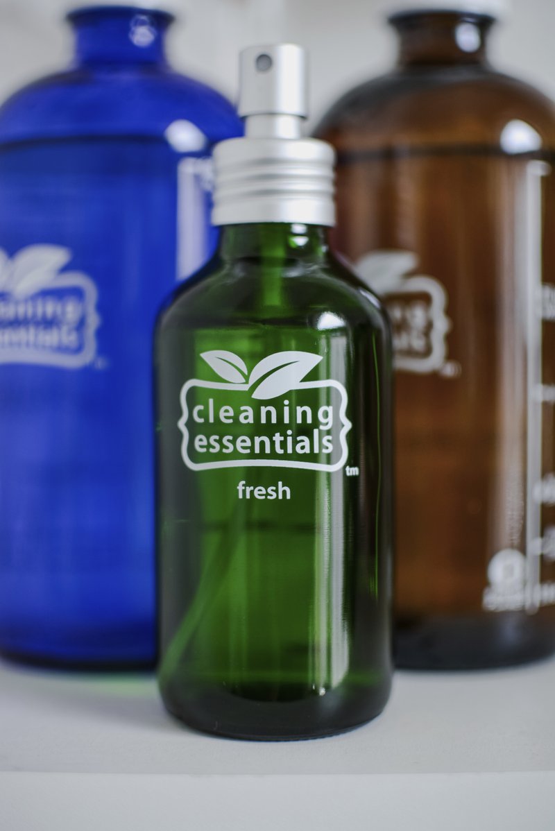 This photo provided by Cleaning Essentials shows some of the company's reusable glass cleaning bottles available online and in stores. (Ali Rainer/Cleaning Essentials via AP)