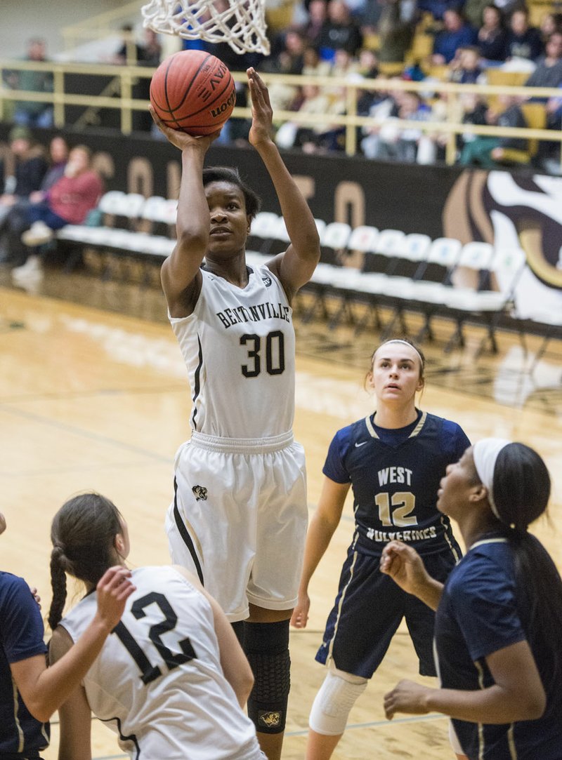 NWA Democrat-Gazette/BEN GOFF @NWABENGOFF Maryam Dauda (30) of Bentonville shoots during the game vs Bentonville West Friday, Jan. 25, 2019, at Bentonville's Tiger Arena.