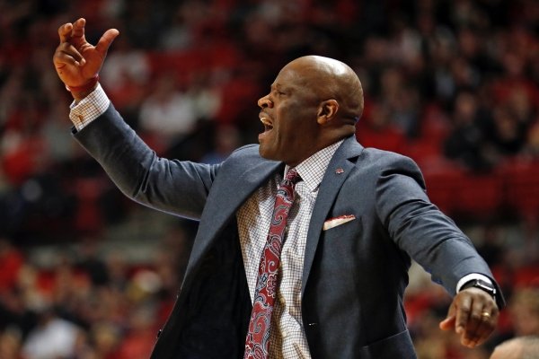 Arkansas coach Mike Anderson yells out to his players during the first half of an NCAA college basketball game against Texas Tech, Saturday, Jan. 26, 2019, in Lubbock, Texas. (AP Photo/Brad Tollefson)