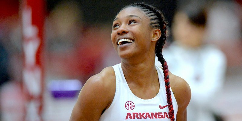 NWA Democrat-Gazette/Andy Shupe CLINICAL: Arkansas senior Kiara Parker reacts to seeing her winning time in the finals of the 60-meter race Saturday during the Razorback Invitational at the Randal Tyson Track Center in Fayetteville.