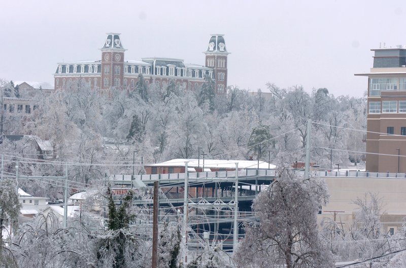 Northwest Arkansas Democrat-Gazette File Photo/ANTHONY REYES
Old Main in Fayetteville Jan. 28, 2009 after a passing winter storm left thousands of trees in the city damaged or destroyed.