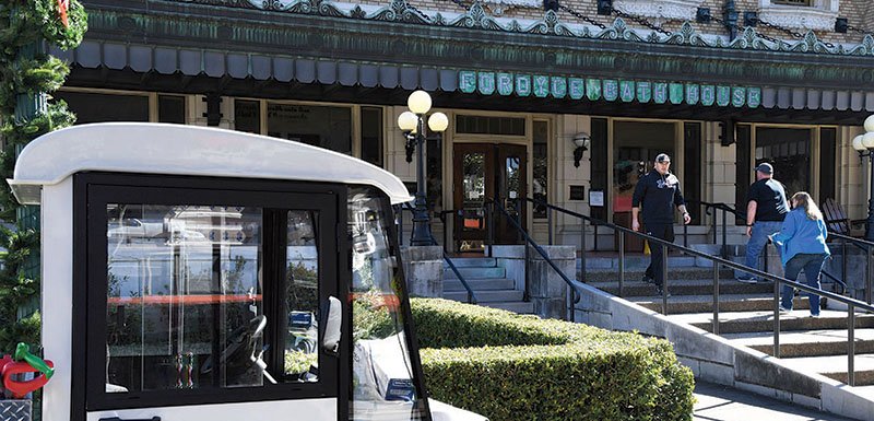 The Sentinel-Record/Grace Brown OPEN FOR BUSINESS: Visitors to Hot Springs National Park enter and exit the Fordyce Bath House on Sunday, following the end of the record-breaking 35-day partial shutdown of the federal government.