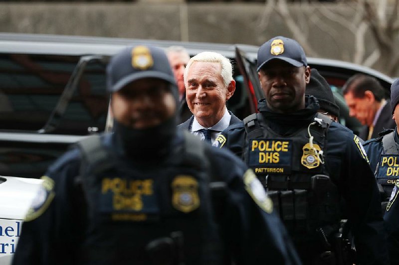 Roger Stone, former campaign adviser to President Donald Trump, arrives for a hearing Tuesday in federal court in Washington where he pleaded innocent to charges of lying to investigators in the Russia investigation, along with counts of obstruction and witness tampering. Stone remains free on $250,000 bond, with limitations on where he can travel. 
