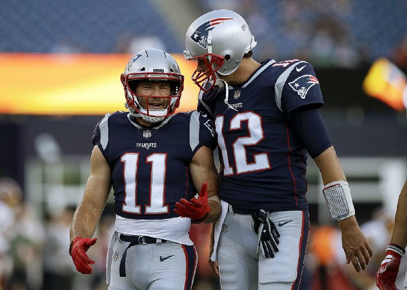 New England Patriots quarterback Tom Brady (right) and wide receiver Julian Edelman will appear in  their fourth Super Bowl together Sunday. Both were late-round draft picks by the Patriots: Brady in the sixth round in 2000 and Edelman in the seventh round in 2009. 