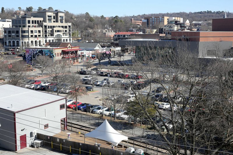 NWA Democrat-Gazette/DAVID GOTTSCHALK Fayetteville City Council members on Tuesday saw final concept drawings for the Cultural Arts Corridor, which would see the Walton Arts Center parking lot transformed into a civic space.
