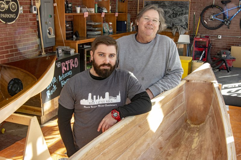 Sam Ellis (front) of Rock Town River Outfitters and Greg Johnson of Little Rock Boat Builders Supply will teach a workshop on building wooden boats, starting Wednesday in Ellis’ shop in Oppenheimer Market Hall at the Little Rock River Market.

