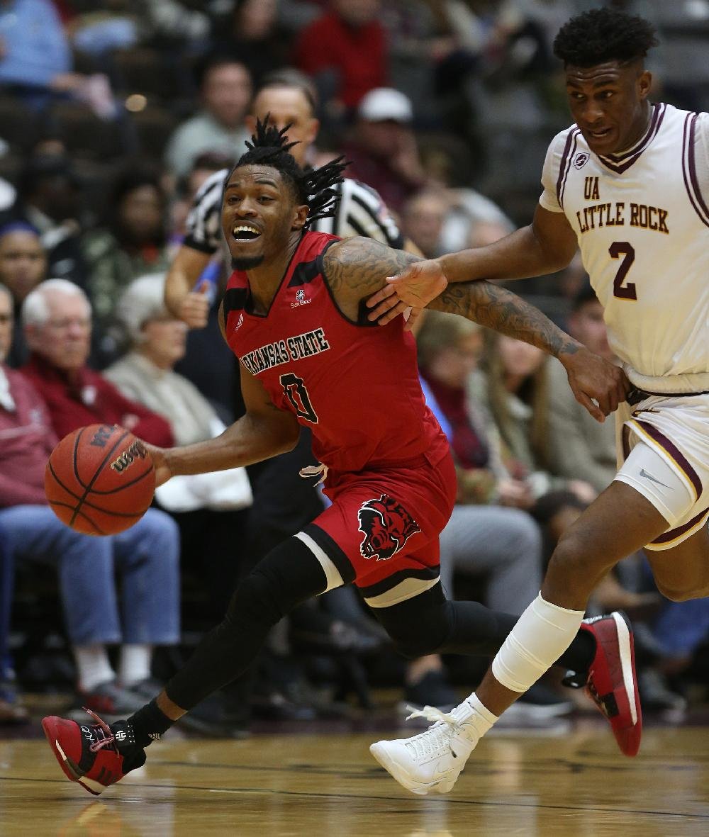 Red Wolves Run Away In Head Scratcher