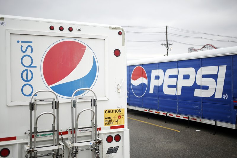 PepsiCo. is the sponsor of the Super Bowl this year. Here delivery trucks sit parked outside the Pepsi Beverages Co. plant in Louisville, Ky., in February. MUST CREDIT: Bloomberg photo by Luke Sharrett