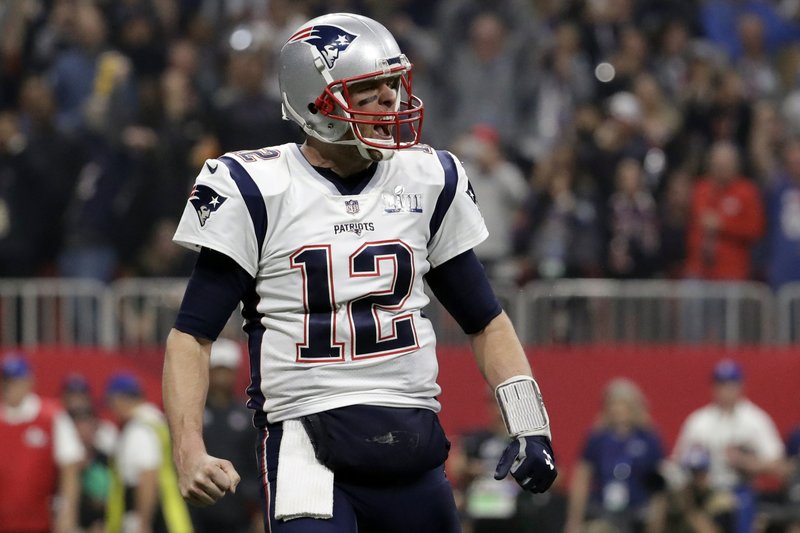 New England Patriots' Tom Brady (12) celebrates a touchdown during the second half of the NFL Super Bowl 53 football game against the Los Angeles Rams, Sunday, Feb. 3, 2019, in Atlanta. (AP Photo/Jeff Roberson)

