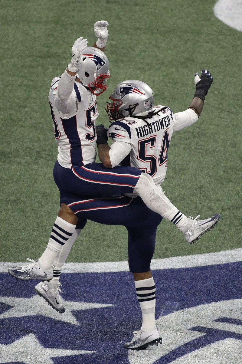 New England Patriots' Dont'a Hightower (54) and New England Patriots' Kyle Van Noy celebrate a sack on Los Angeles Rams' Jared Goff during the second half of the NFL Super Bowl 53 football game Sunday, Feb. 3, 2019, in Atlanta. (AP Photo/Charlie Riedel)