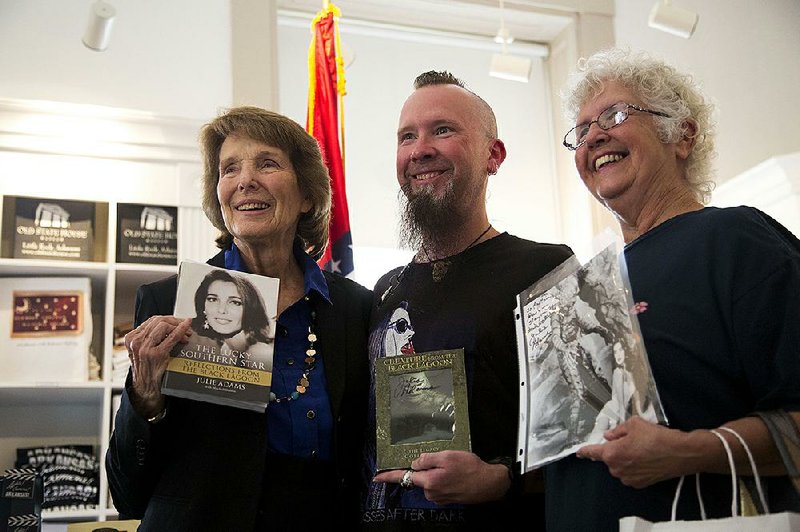 FILE — David Garrett, center, and his mother, right, pose with Hollywood star and Arkansas native Julie Adams at a book signing August 10 at the Old Statehouse. 