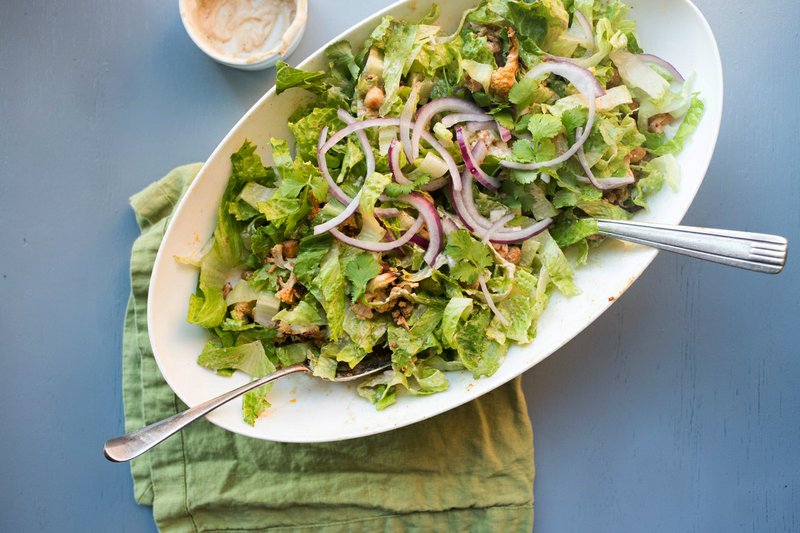 Roasted Cauliflower and Chickpea Salad With Tahini Dressing (Lucy Beni via AP)