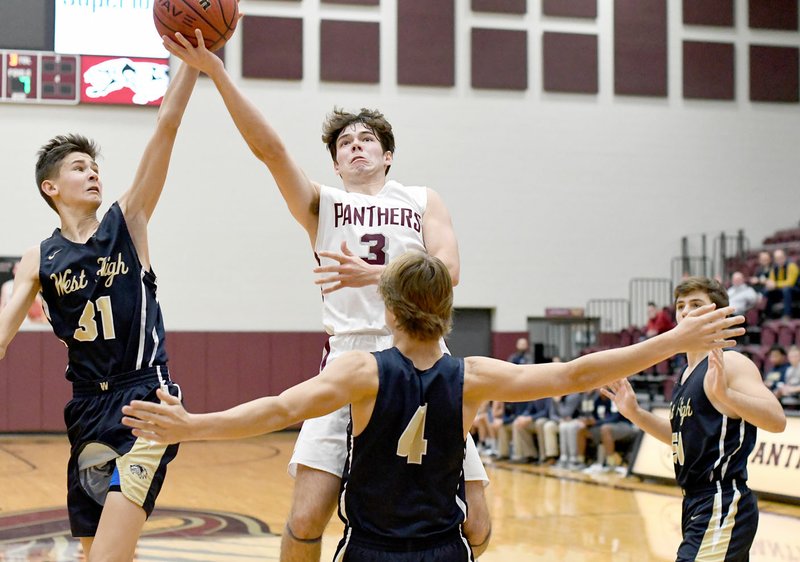 Bud Sullins/Special to the Herald-Leader Siloam Springs senior Murphy Perkins drives to the basket against Bentonville West during a game earlier this season. Perkins and the Panthers host Greenbrier at 6 p.m. Friday for homecoming.