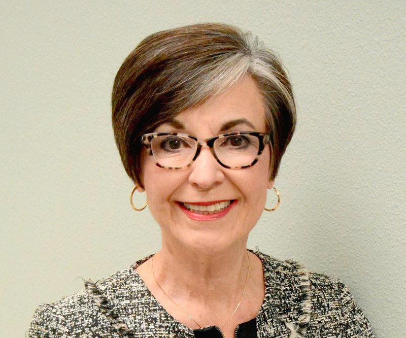 Raquel Beck, pictured in the entryway to Community Clinic Siloam Springs, will be honored at the 89th annual Chamber of Commerce Banquet on Thursday.