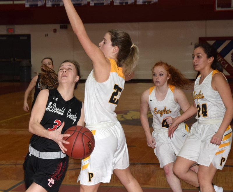 RICK PECK/SPECIAL TO MCDONALD COUNTY PRESS McDonald County's Sam Frazier goes in for a layup during the Lady Mustangs' 58-36 win on Jan. 31 over Purdy in the Seneca Girls' Basketball Tournament.