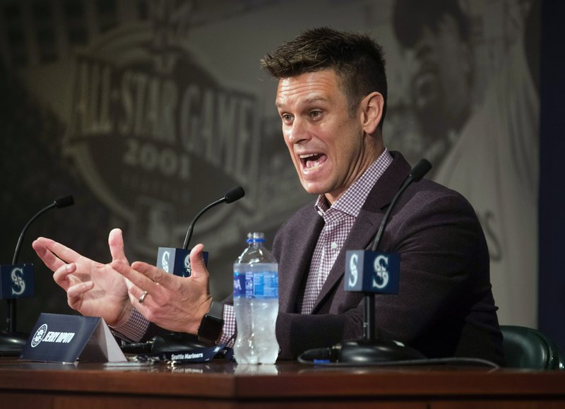 In this Jan. 24, 2019, file photo, Seattle Mariners General Manager Jerry Dipoto answers questions during a press conference in Seattle. Major League Baseball's independent investigation found no credible evidence to support claims of disparaging comments and discriminatory treatment by members of the Seattle Mariners front office.  (Steve Ringman/The Seattle Times via AP, File)
