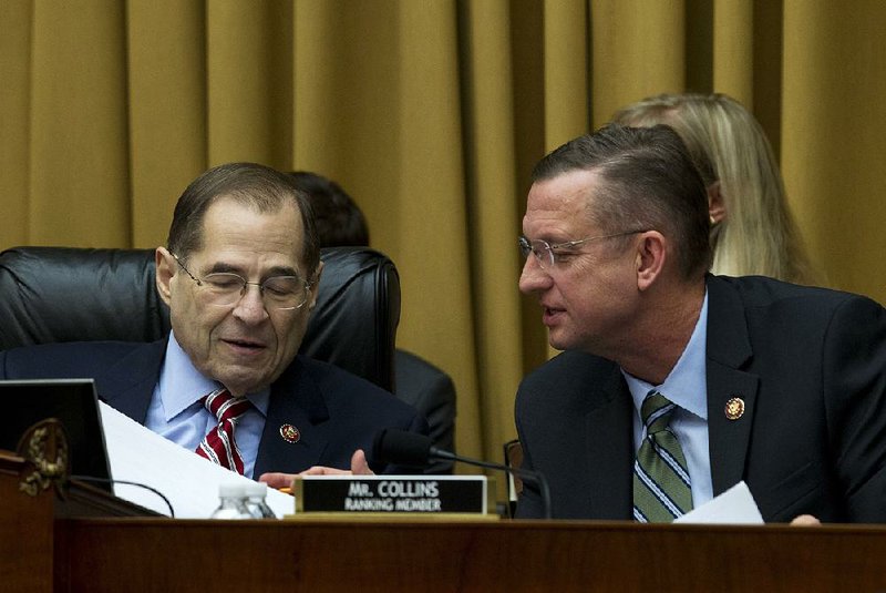 House Judiciary Committee Chairman Jerrold Nadler (left) and ranking member Rep. Doug Collins confer Thursday before the committee approved a possible subpoena of acting Attorney General Matthew Whitaker. 