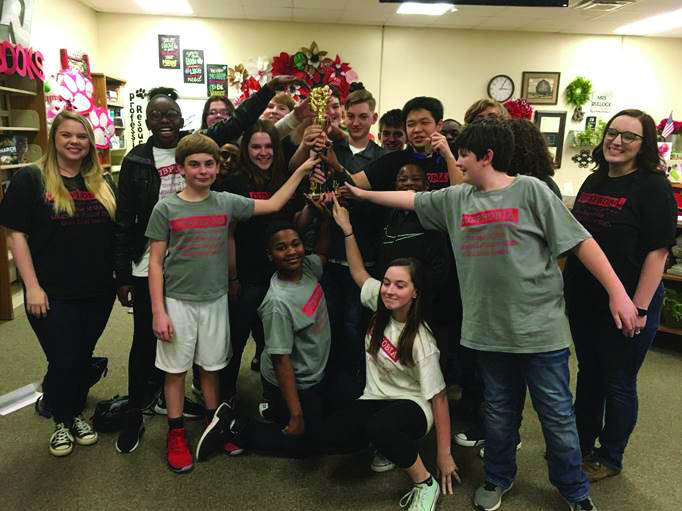 The MJHS Quiz Bowl Team celebrate a victory at the 5A South Regional Tournament
