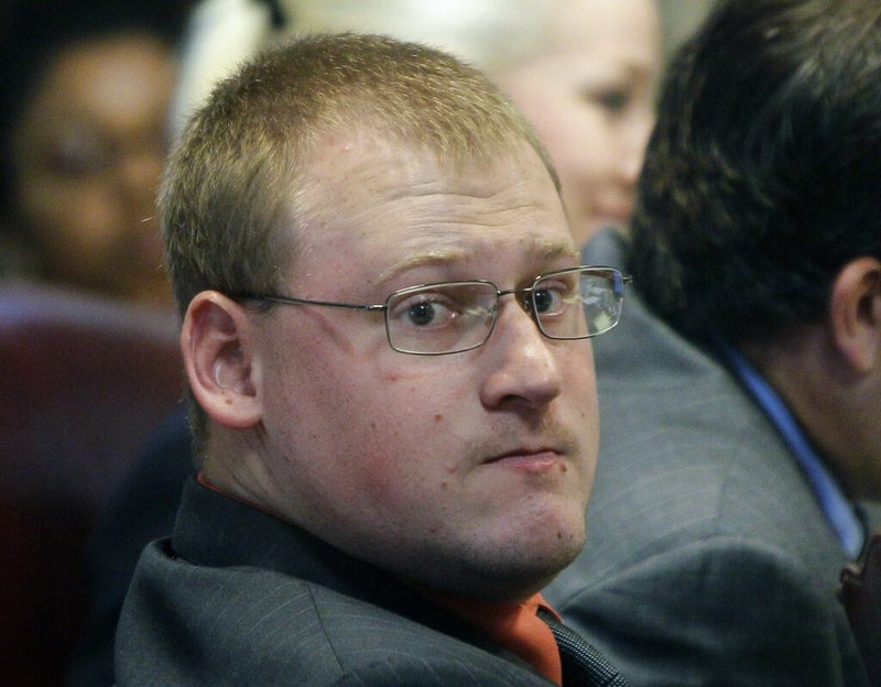 In this June 21, 2013 file photo, former Little Rock Police Officer Josh Hastings listens to testimony in his manslaughter trial at the Pulaski County Courthouse in Little Rock, Ark. A federal appeals court has ruled that a Little Rock woman whose 15-year-old son was killed by Hastings cannot try to hold the city or a retired police chief accountable for the shooting. The Arkansas Democrat-Gazette reports that a federal court in St. Louis upheld a decision Thursday, Feb. 7, 2019, that dismissed Little Rock and Stuart Thomas from Sylvia Perkins' wrongful death lawsuit. Thomas was police chief when Perkins' son, Bobby Moore, was killed by Joshua Hastings in 2012. (AP Photo/Danny Johnston, File)