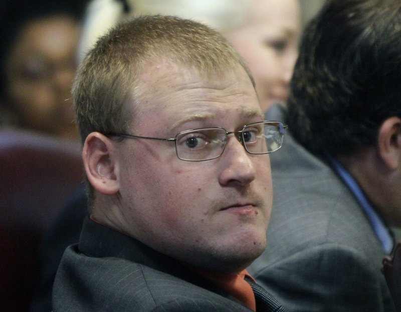 In this June 21, 2013 file photo, former Little Rock Police Officer Josh Hastings listens to testimony in his manslaughter trial at the Pulaski County Courthouse in Little Rock. A federal appeals court has ruled that a Little Rock woman whose 15-year-old son was killed by Hastings cannot try to hold the city or a retired police chief accountable for the shooting. The Arkansas Democrat-Gazette reports that a federal court in St. Louis upheld a decision Thursday that dismissed Little Rock and Stuart Thomas from Sylvia Perkins' wrongful death lawsuit. Thomas was police chief when Perkins' son, Bobby Moore, was killed by Joshua Hastings in 2012. (AP Photo/Danny Johnston, File)

