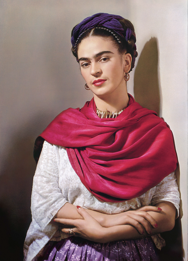 Frida Kahlo wears a rebozo (shawl) in Nickolas Muray’s 1939 color carbon print "Frida with Magenta Rebozo 'Classic.'” It is part of an exhibition of photographs of Kahlo at the Arkansas Arts Center. (​​​​​Courtesy Throckmorton Fine Art, New York)
