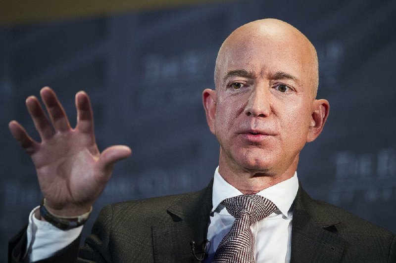 A high-profile clash has pitted Amazon CEO Jeff Bezos, shown in September, against David Pecker, the leader of America’s best- known tabloid and a staunch supporter of President Donald Trump. 