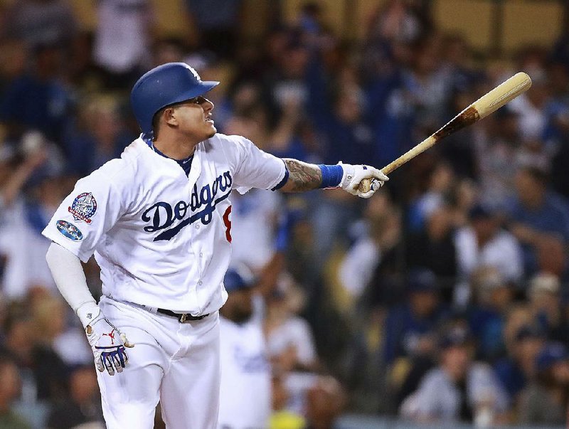 The pace of signing free agents like shortstop Manny Machado (above) has been a source of concern for Commissioner Rob Manfred. “We want players signed, particularly star players. I wish they were signed and ready to go,” Manfred said. “We got another week before they have to report. I’m really hopeful that it’s going to get resolved during that period of time.”