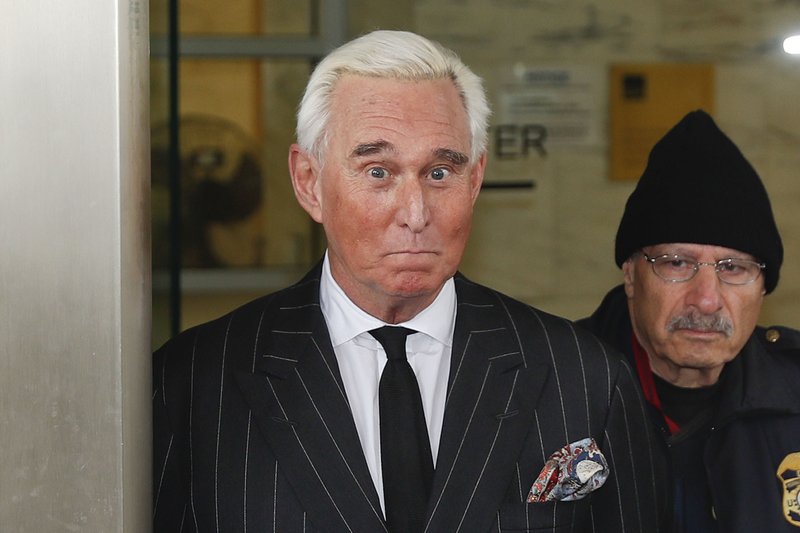 FILE - In this Feb. 1, 2019 file photo, former campaign adviser for President Donald Trump, Roger Stone, leaves federal court in Washington. (AP Photo/Pablo Martinez Monsivais)