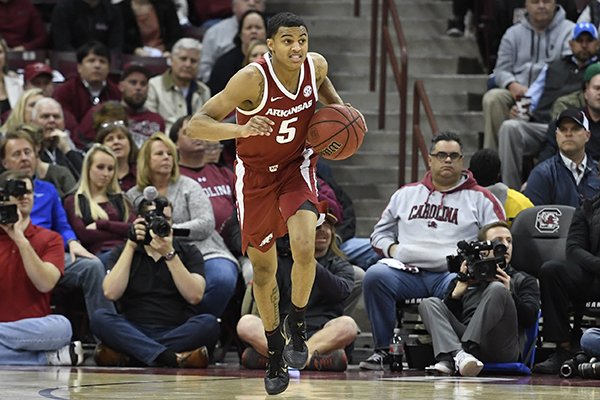 Arkansas guard Jalen Harris brings the ball up the floor during a game against South Carolina on Saturday, Feb. 9, 2019, in Columbia, S.C.