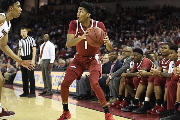 Arkansas guard Isaiah Joe looks to pass the ball during a game against South Carolina on Saturday, Feb. 9, 2019, in Columbia, S.C.